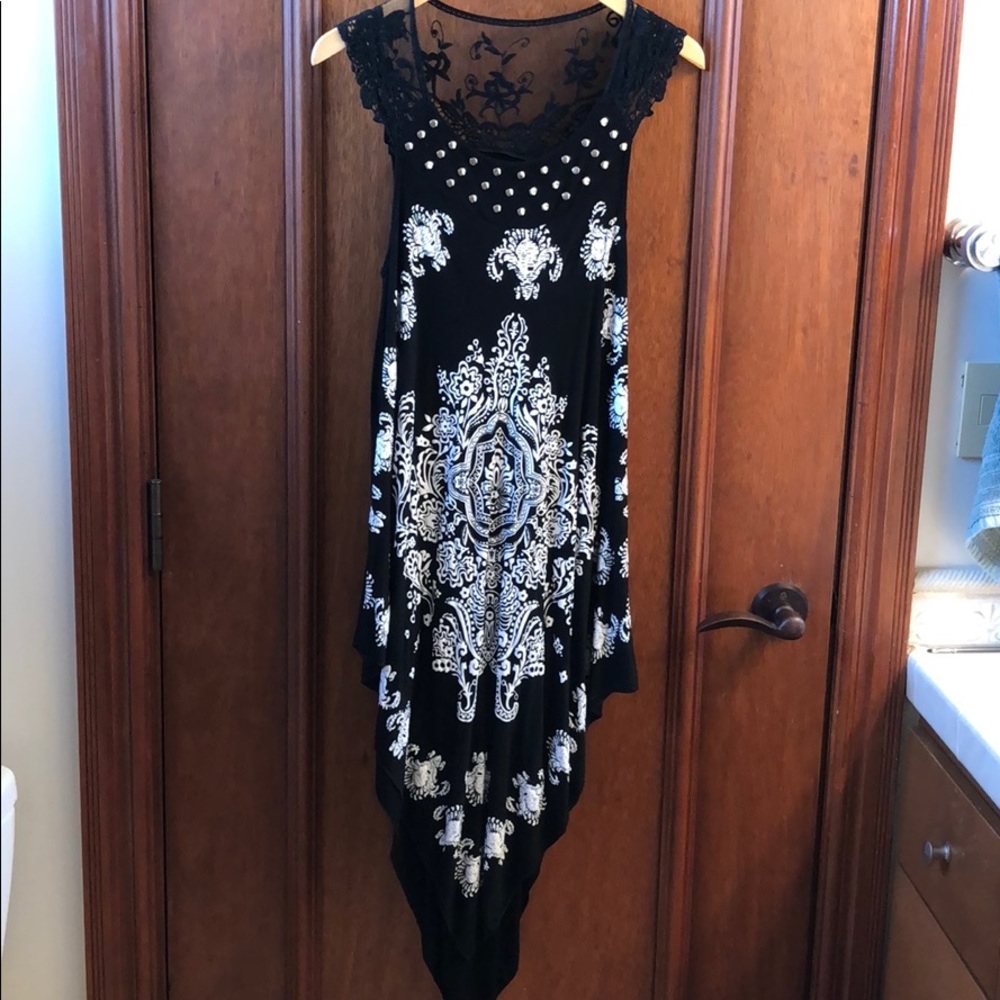 Black midi dress with flattering triangle hemline